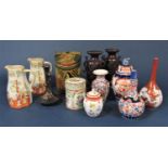 A collection of 19th century and later oriental ceramics including an imari bottle shaped vase,