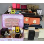 Large quantity of designer perfume bottles, mostly boxed, many empty, including bottles by Gucci,