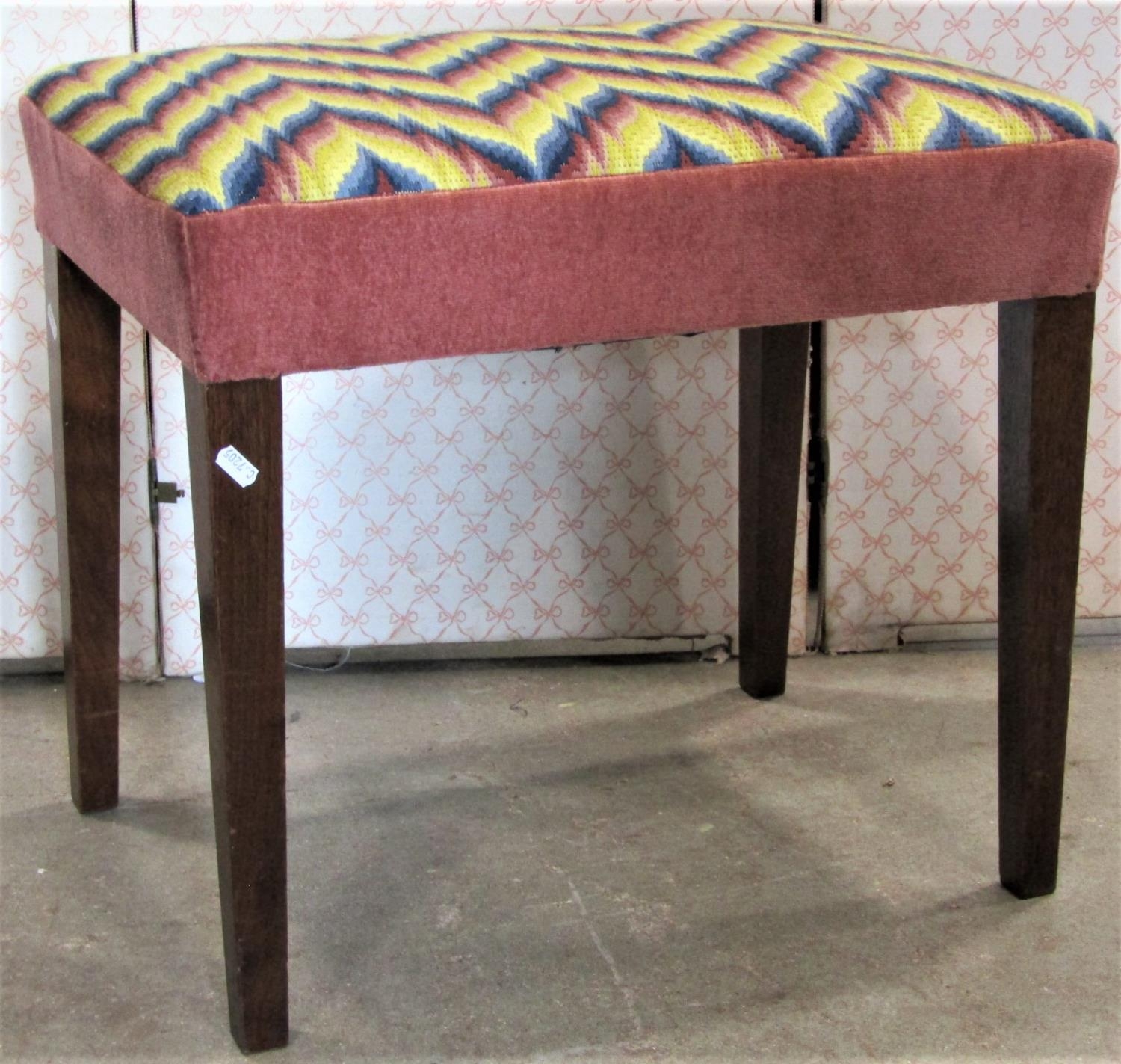 An Edwardian Georgian style stool with rectangular upholstered tapestry seat raised on square