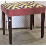 An Edwardian Georgian style stool with rectangular upholstered tapestry seat raised on square