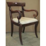 A 19th century mahogany bar back carver chair with open scrolled arms, drop in pad seat and sabre