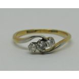 18ct three stone diamond crossover ring, size N, 2.1g