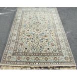 Good quality large Keshan country house carpet, with various scrolled foliage upon a light blue/
