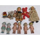 9 miniature bisque dolls, C1920's, most styled as Flapper girls, height 6-9cm, together with a small