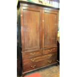 A Georgian mahogany linen press, enclosed by two long and two short graduated drawers, the upper