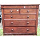 A Victorian mahogany bedroom chest fitted with an arrangement of four long and two short graduated