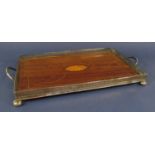 Edwardian white metal and walnut gallery tray, the central wooden panel inlaid with a conch shell,