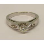 18ct white gold diamond ring in raised setting, centre stone 0.35cts approx, size N/O, 4.8g