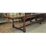 A good quality Old English style oak drawleaf dining table with rectangular top and moulded frieze
