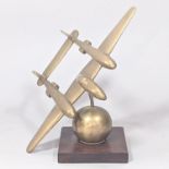 Trench Art Interest - An artificer-art bell metal model of a P51 Lightening, circa WW2, raised on a