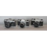 Three Pentax Sportmatic cameras SPH2 and SP2 models