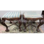 A good pair of 19th century rosewood centre stools, probably Portuguese, with serpentine outline,