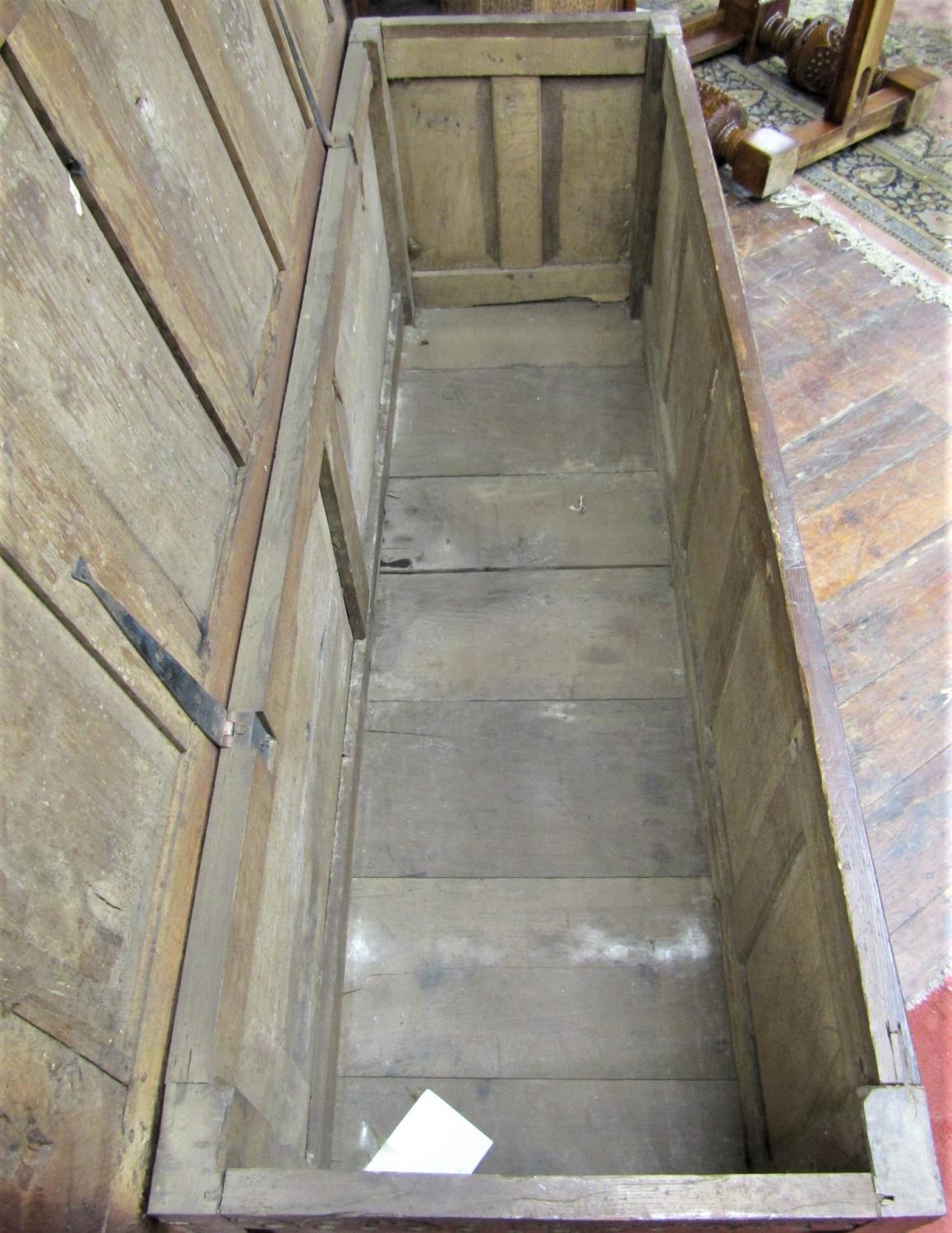 A substantial Georgian oak coffer with repeating geometric detail, within a panelled framework, - Image 3 of 7