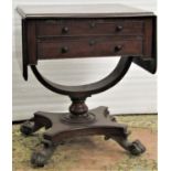 A Regency mahogany ladies sewing table/writing table, the rectangular top supporting two drop leaves