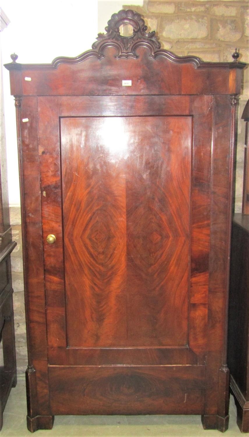 A 19th century mahogany veneered dwarf hall/robe with carved shaped and moulded pediment and