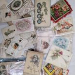 A collection of late 19th and early 20th century greetings cards including lace and cut out