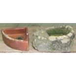A weathered rough hewn natural stone trough, approx 50cm long x 32cm wide x 17cm high, together with