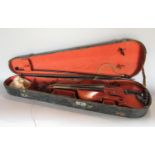 A Czechoslovakian students violin with timber case and bow