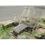 Two similar weathered teak folding steamer chairs with slatted seats, backs and footrests, one