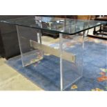 A modernist side/centre table with removable thick bevelled edge plate glass top raised on moulded