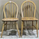 Five similar Windsor style elm and beechwood hoop and stickwood dining chairs (possibly all Ercol