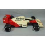 Large static kerbside model of McLaren Honda Formula 1 Racing Car MP4/4 1988, likely to have been