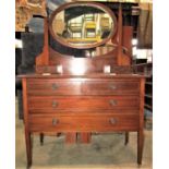 An inlaid Edwardian mahogany dressing chest with chequered stringing and oval swing mirror with