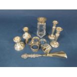 Mixed collection of silver comprising a pair of silver candlesticks, a pair of dwarf candlesticks,