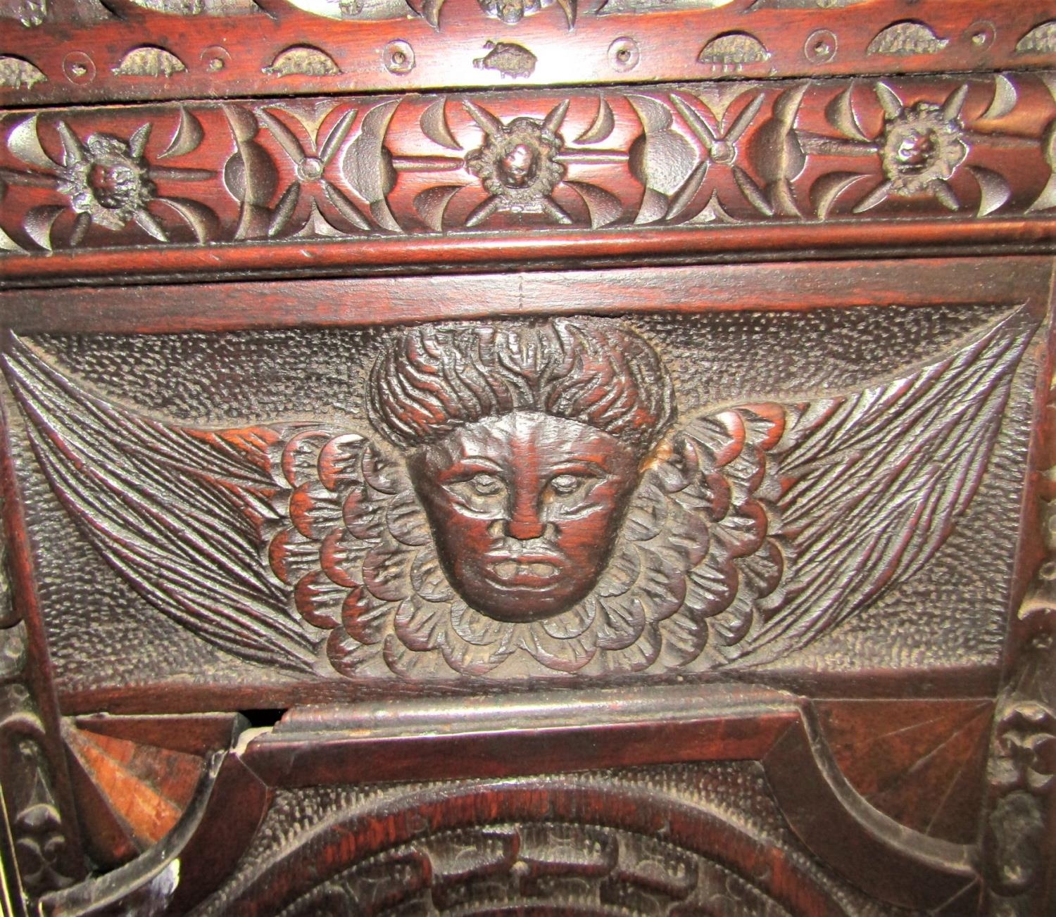 A 19th century oak longcase clock, the case profusely carved depicting a lion, eagle, cherubs, - Image 5 of 7