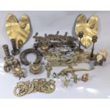A quantity of small brassware including a large good luck horseshoe, ornaments in the form of