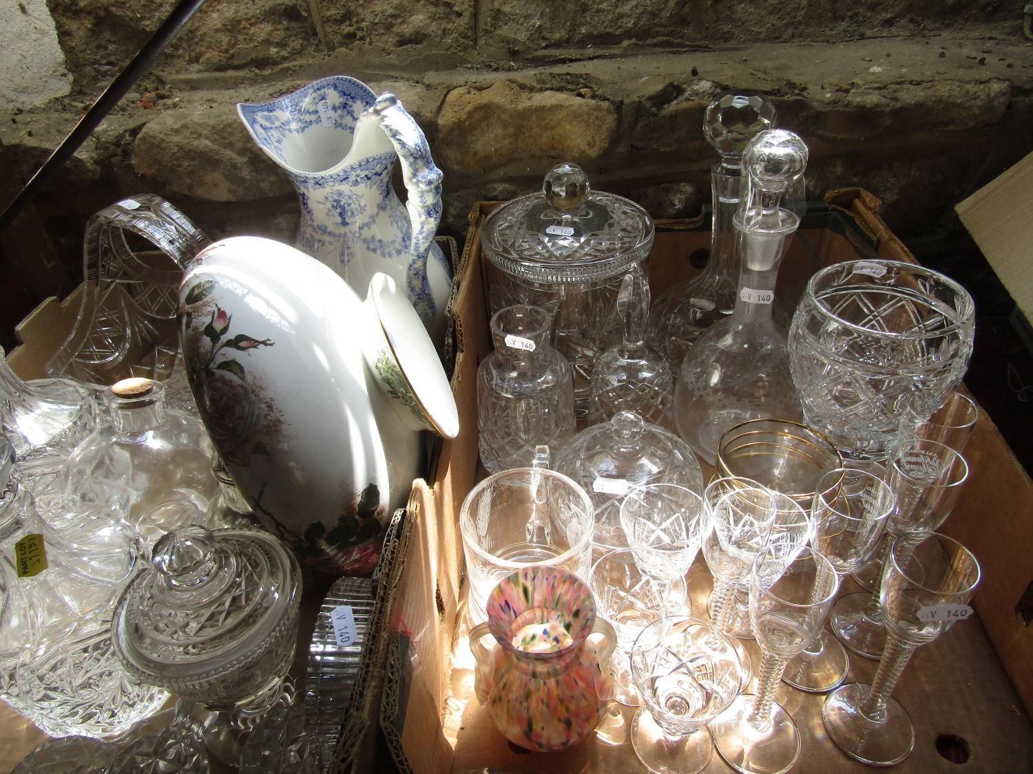 Two boxes of various glassware to include a Murano mottled glass twin handled vase, various