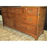 A reproduction military style yewwood veneered dresser with brass flush fittings, fitted with an