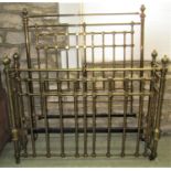 A good quality Victorian brass and iron double bedstead, the tubular framework withy cube