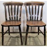 A harlequin set of six traditional Windsor stained elm and beechwood lathe back kitchen chairs