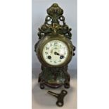 Late 19th century French painted spelter mantel clock, the casework with dolphin, floral, scroll and