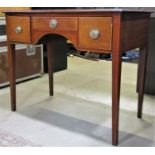 A Georgian mahogany side table with inlaid boxwood stringing fitted with an arrangement of three