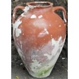 A weathered terracotta two handled oviform tapered jar/amphora with weathered painted finish, 48cm