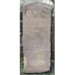 A reclaimed natural stone marker, with carved lettering CN7 LS and dated 1783, 98cm high x 36cm wide
