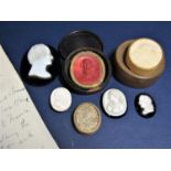 A collection of 19th century cameos in wax, plaster and ceramic (7)