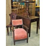 A 19th century oak single dropleaf cottage dining table with dummy end drawers and raised on four