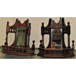 A pair of small late Victorian walnut hanging wall shelves/brackets with inset rectangular