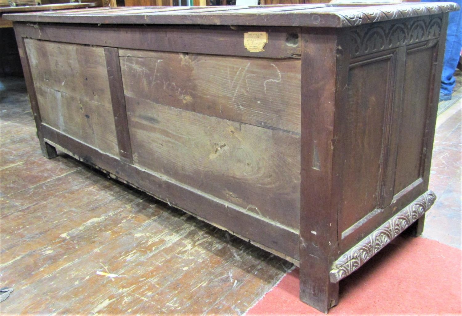 A substantial Georgian oak coffer with repeating geometric detail, within a panelled framework, - Image 5 of 7