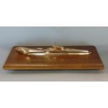 Trench art and WWII interest - an artificer-art model of a submarine, raised on an oak base, to the