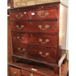 A Georgian style mahogany bachelors chest with brushing slide over two short and three long