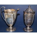 1930s stylised silver jug and castor duo, each with embossed panels, maker Aide Bros, Sheffield
