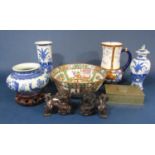A collection of oriental blue and white ceramics including a vase of cylindrical form with painted