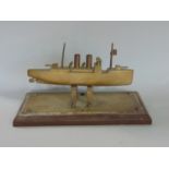 Trench Art Interest - WW2 interest: an artificer-art bell metal model of an Armed Tug Boat, 18cm lon