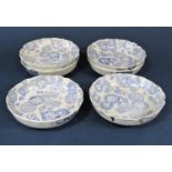 Set of six oriental blue and white dishes with printed decoration of coins and tokens, 15.5cm