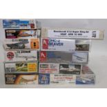 A collection of 16 model kits ofll, light aircraft, all believed to be complete and some in sealed