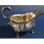 Good quality late Victorian silver lobed sauce boat with S scroll handle and shell hoof feet,